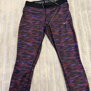 Nike Women's Purple and Red Patterned Capris